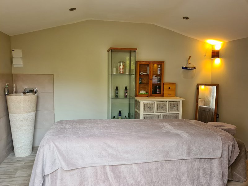 Treatment Room with massage bed