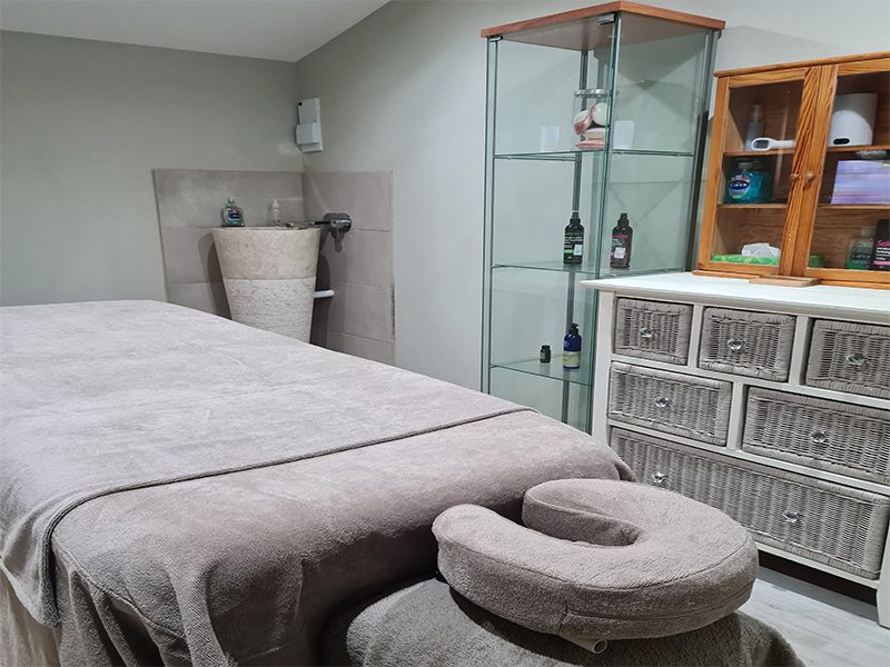 Treatment Room with massage bed